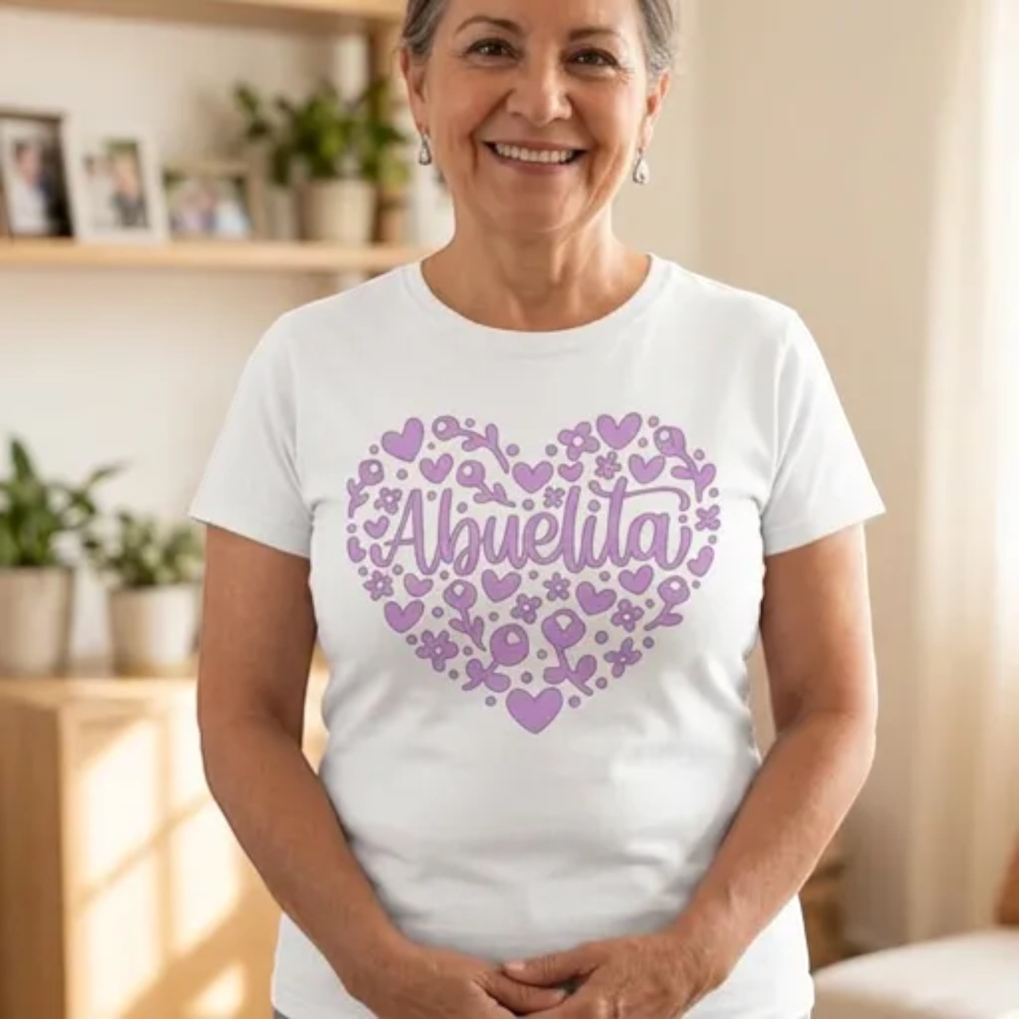 The Beauty Closet white crewneck t-shirt featuring a purple heart graphic with floral patterns and Abuelita text.