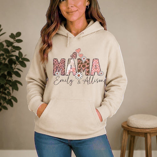 The Beauty Closet beige hooded sweatshirt featuring a Mama graphic with leopard print, polka dots, and floral accents.