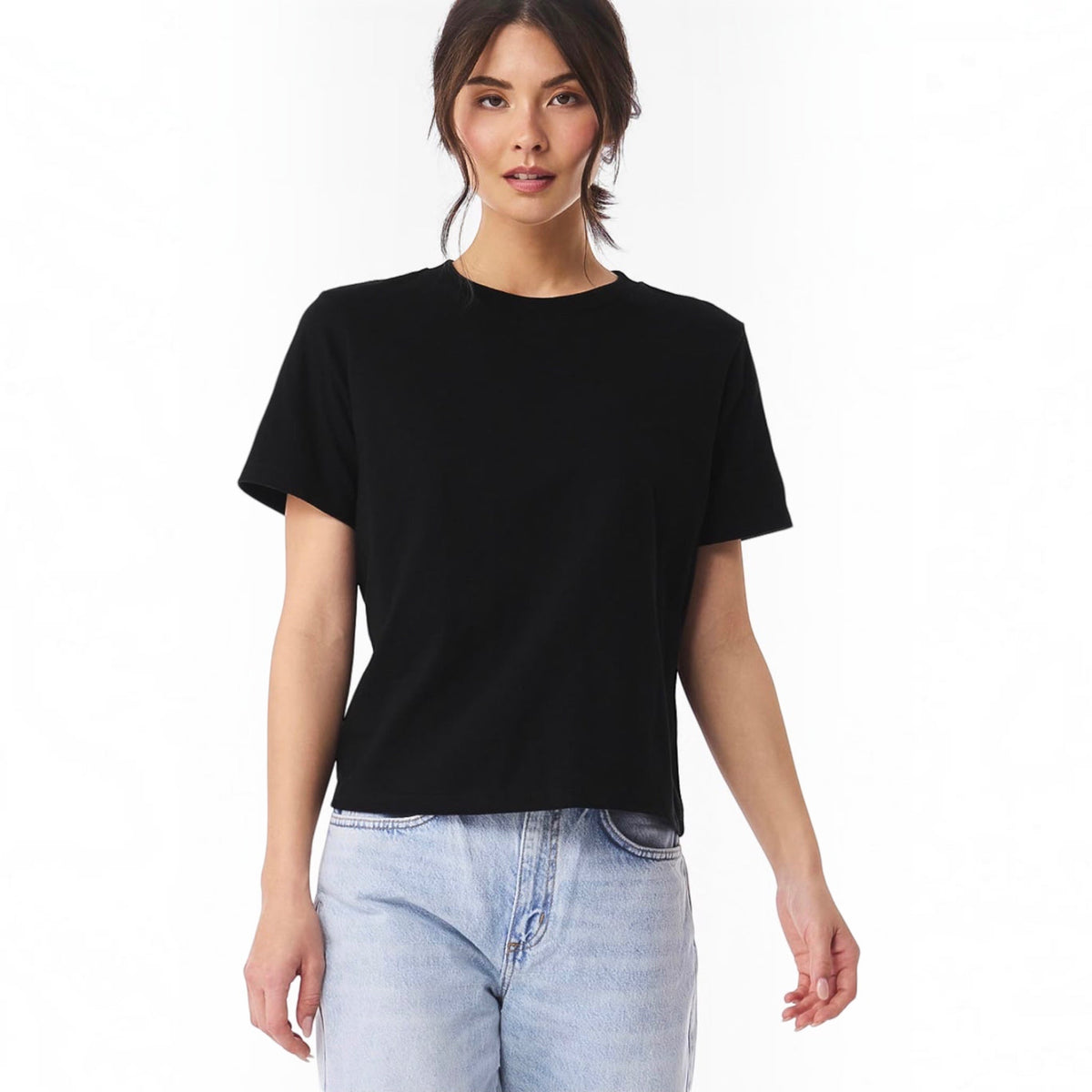 The Beauty Closet black cotton crewneck t-shirt worn by a woman with light wash denim jeans