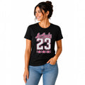 The Beauty Closet black cotton t-shirt with pink Los Angeles 23 graphic print worn by a smiling woman
