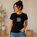 Woman wearing a black The Beauty Closet t-shirt with a colorful Hagan todo con amor graphic print