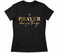 The Beauty Closet black cotton t-shirt with gold and tan "PRAYER changes things" graphic and cross.