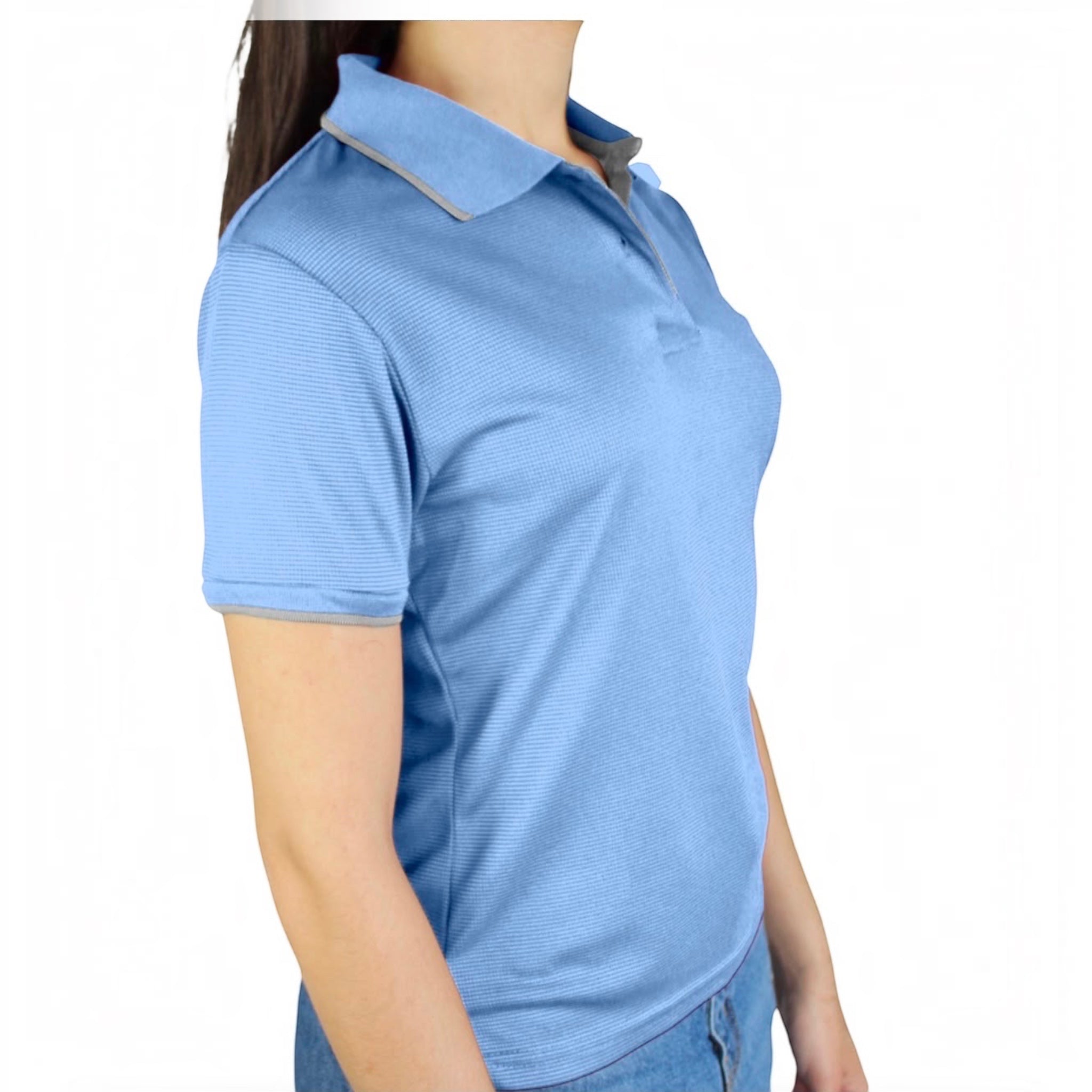 The Beauty Closet light blue short sleeve polo shirt with grey collar trim and textured fabric on a model