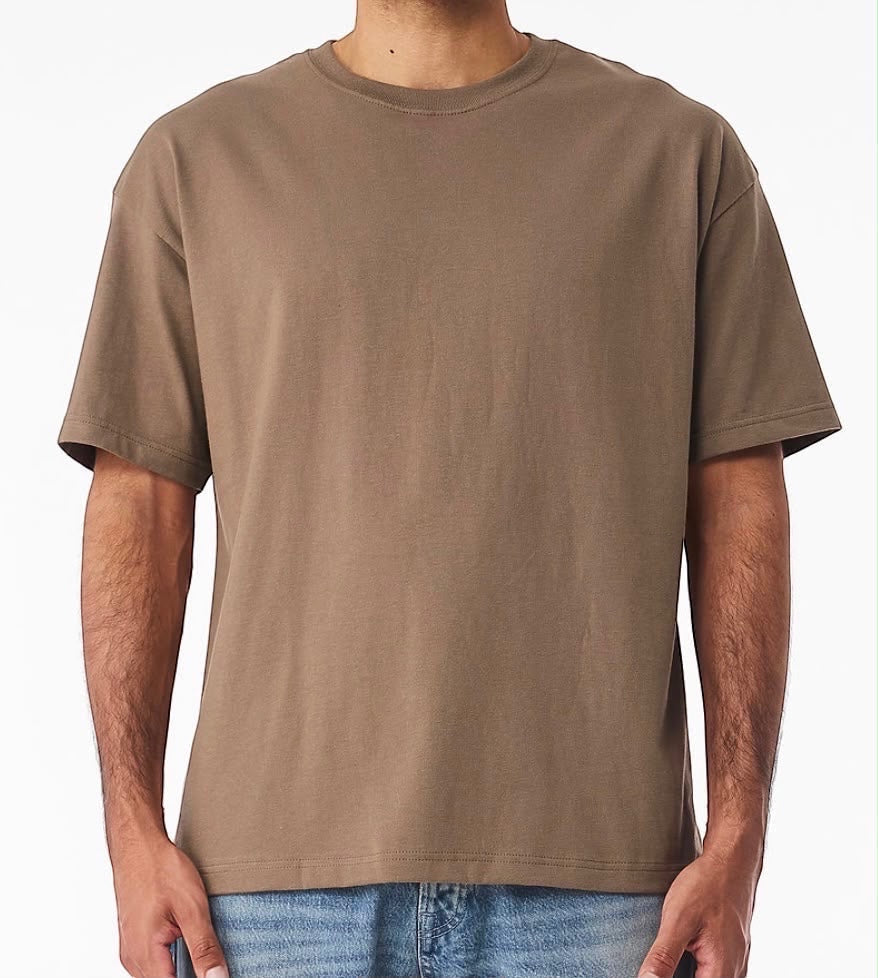 The Beauty Closet brown cotton crewneck t-shirt with a relaxed fit worn with blue denim jeans
