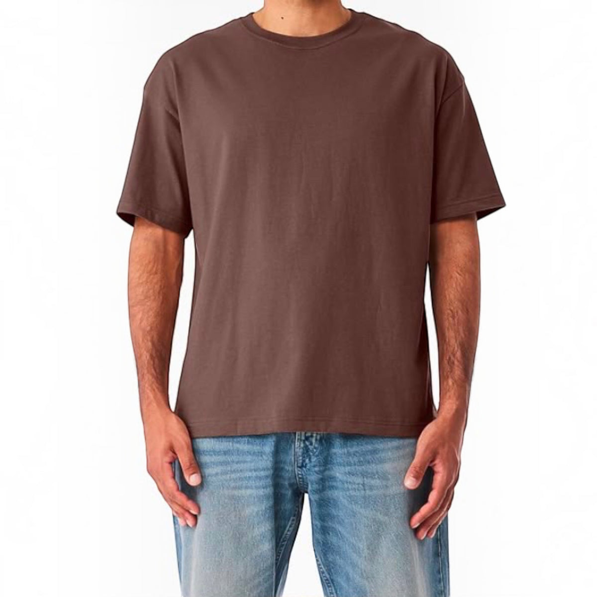 The Beauty Closet brown short sleeve crewneck t-shirt in a relaxed fit worn with blue denim jeans