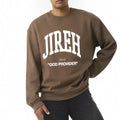 The Beauty Closet brown crewneck sweatshirt featuring white JIREH GOD PROVIDER text worn by a man
