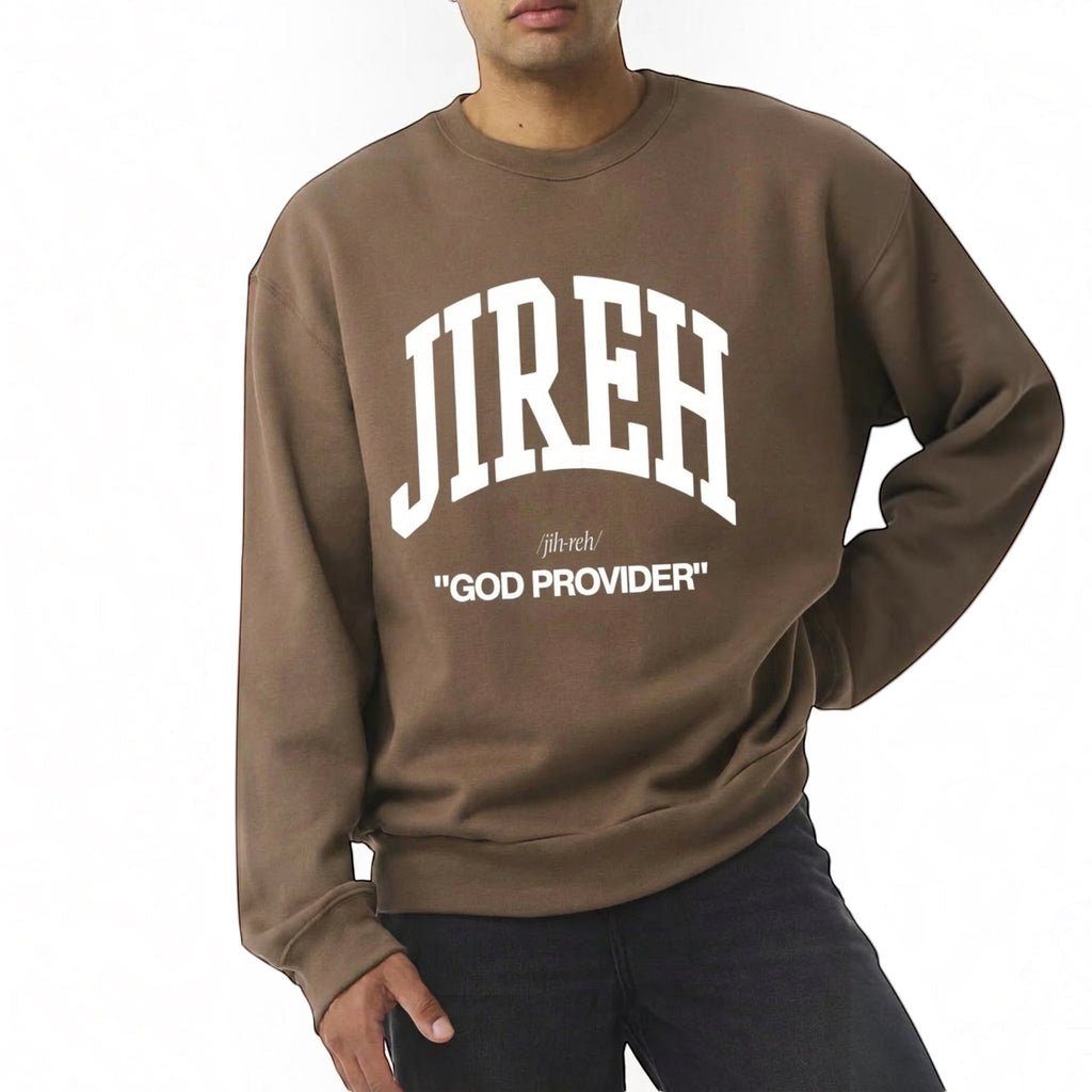 The Beauty Closet brown crewneck sweatshirt featuring white JIREH GOD PROVIDER text worn by a man