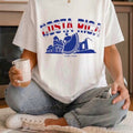 The Beauty Closet cream cotton t-shirt featuring a Costa Rica graphic print with blue and red typography.