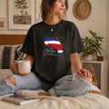 The Beauty Closet black cotton crewneck t-shirt featuring a Costa Rica map graphic with flag colors and Pura Vida text