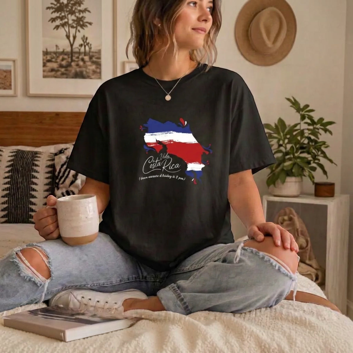 The Beauty Closet black cotton crewneck t-shirt featuring a Costa Rica map graphic with flag colors and Pura Vida text