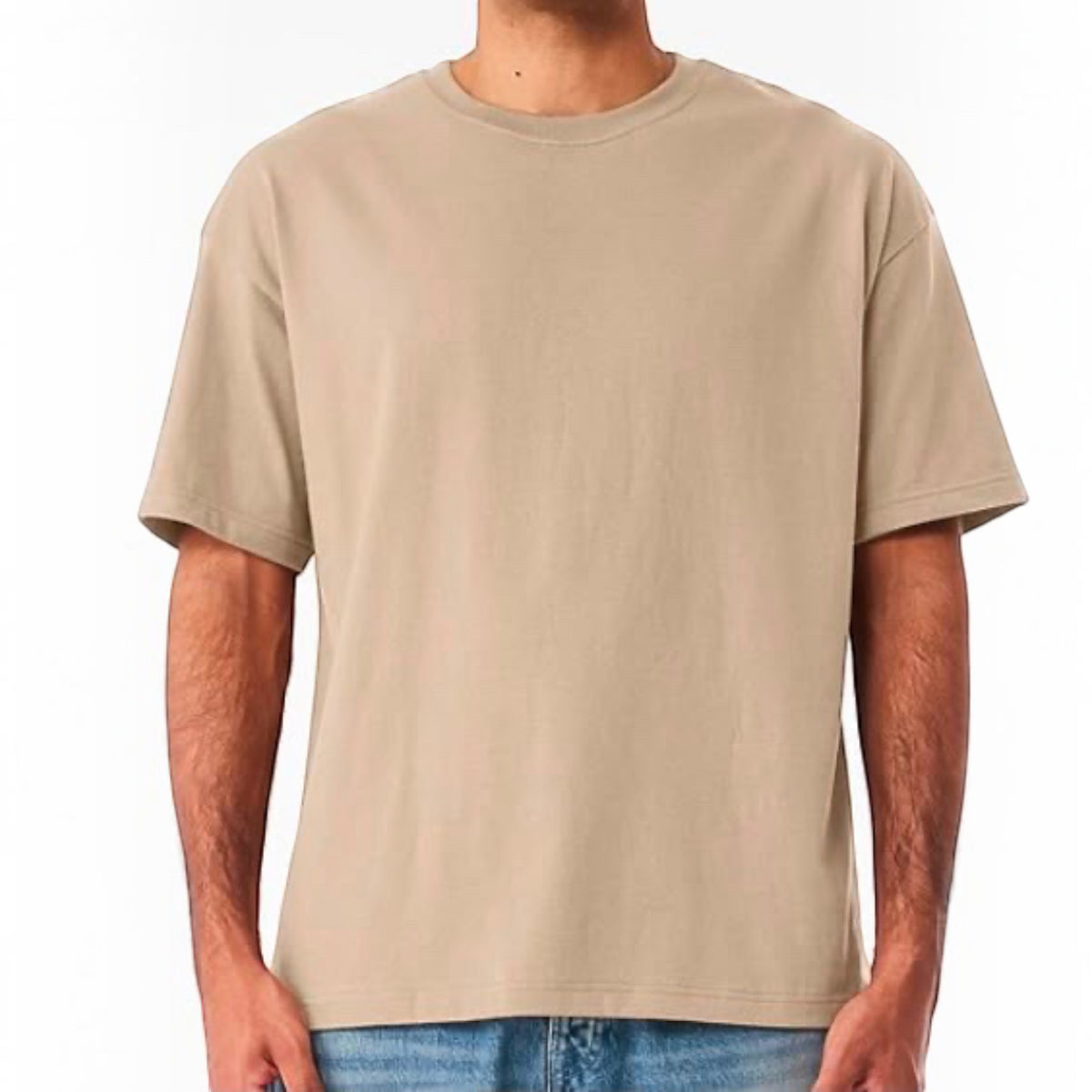 The Beauty Closet cream cotton crewneck t-shirt with a relaxed fit worn by a man with blue jeans