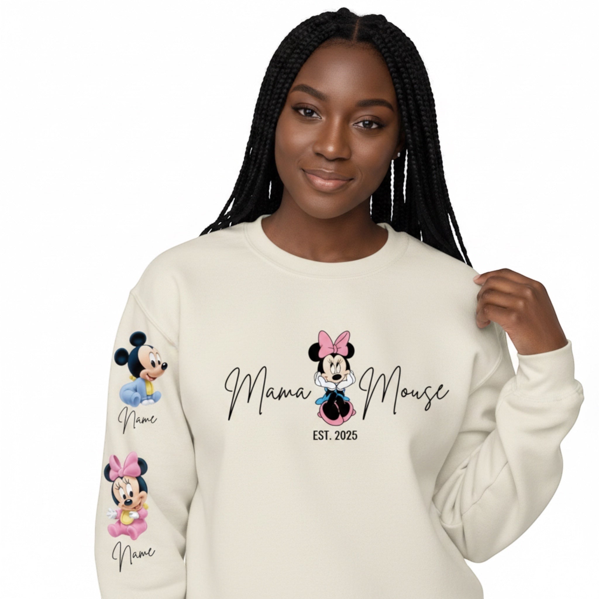 The Beauty Closet cream crewneck sweatshirt with Minnie Mouse Mama graphic and sleeve character prints on a model.