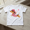 The Beauty Closet white cotton t-shirt featuring a cute dachshund wearing a beret and striped shirt with sunglasses