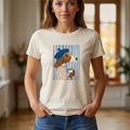 The Beauty Closet cream cotton t-shirt featuring a cute dog illustration wearing a beret and glasses drinking coffee.