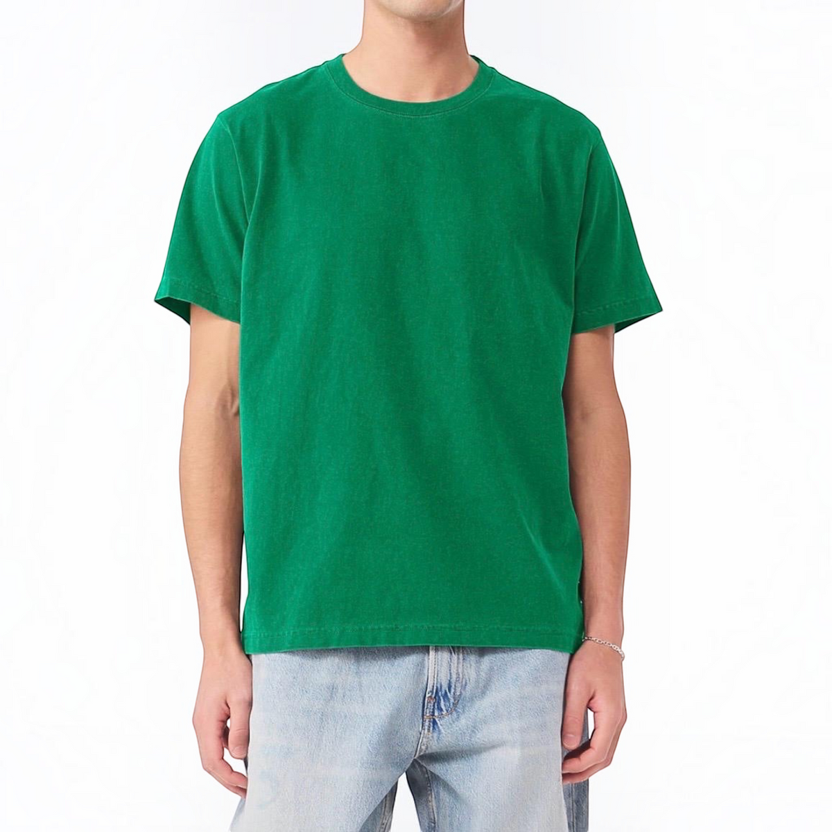 The Beauty Closet emerald green crew neck short sleeve cotton t-shirt worn by a man with light wash denim jeans