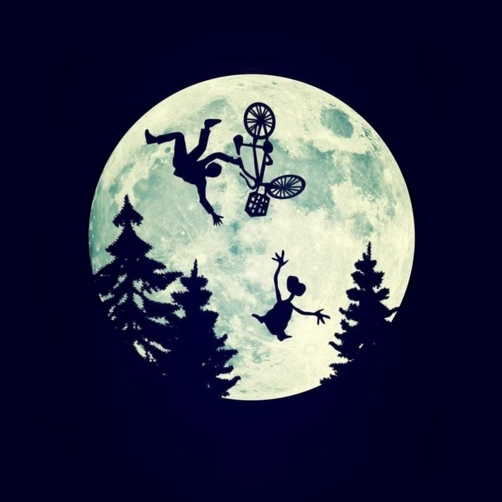 The Beauty Closet graphic print featuring a silhouette of a boy on a bicycle and E.T. flying against a full moon