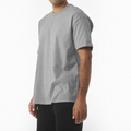 A man wearing a grey crew neck short sleeve cotton t-shirt from The Beauty Closet, featuring a relaxed classic fit.