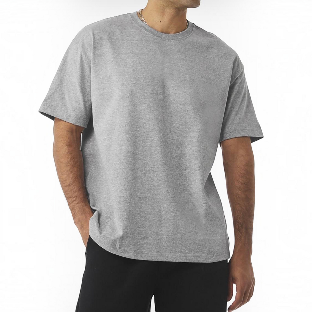 The Beauty Closet grey crew neck short sleeve cotton t-shirt worn by a man with black trousers