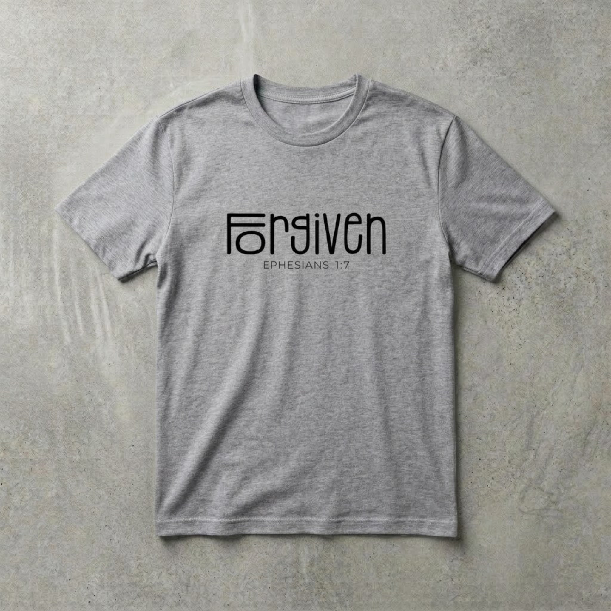 The Beauty Closet grey crew neck t-shirt with black Forgiven Ephesians 1:7 graphic print on soft cotton fabric