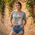 The Beauty Closet grey crewneck t-shirt featuring a colorful giraffe graphic with sunglasses against a brick wall.