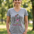 A woman wearing a grey V-neck t-shirt from The Beauty Closet featuring a Super Mom graphic with a heart and crown.