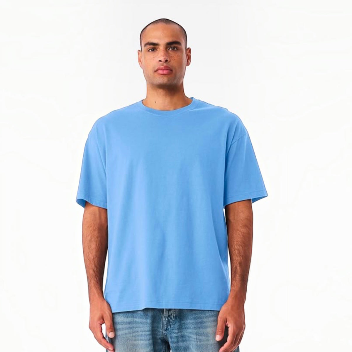 The Beauty Closet light blue crewneck t-shirt worn by a man, featuring a relaxed fit and soft cotton fabric.