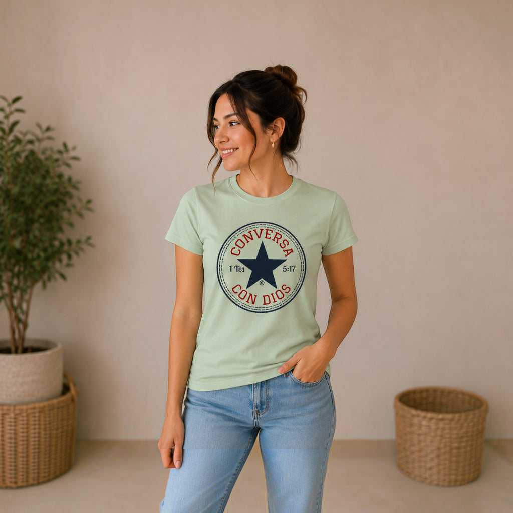 Woman wearing a light green The Beauty Closet t-shirt with a navy blue star graphic and text print