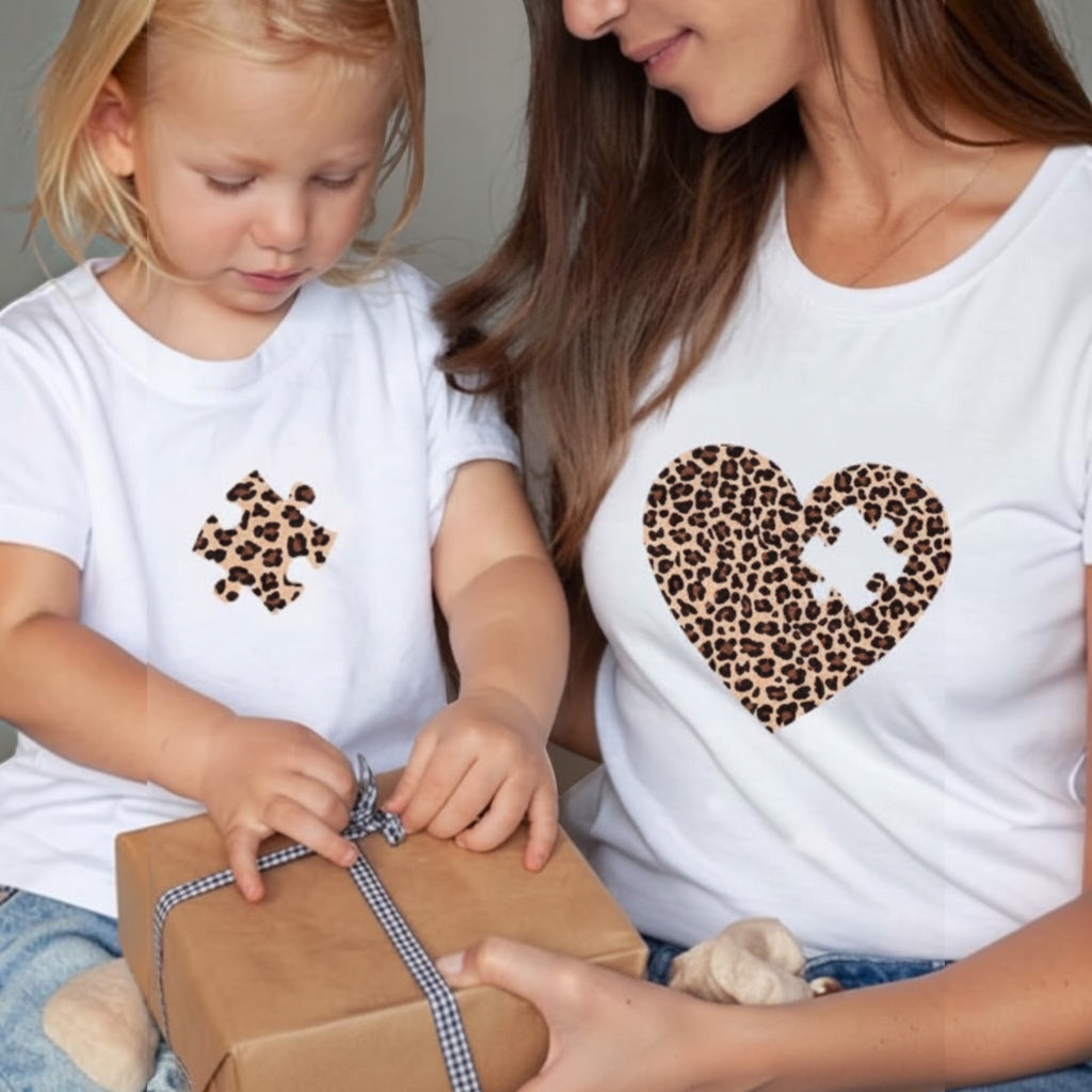 The Beauty Closet white matching mother and child t-shirts with leopard print heart and puzzle piece design