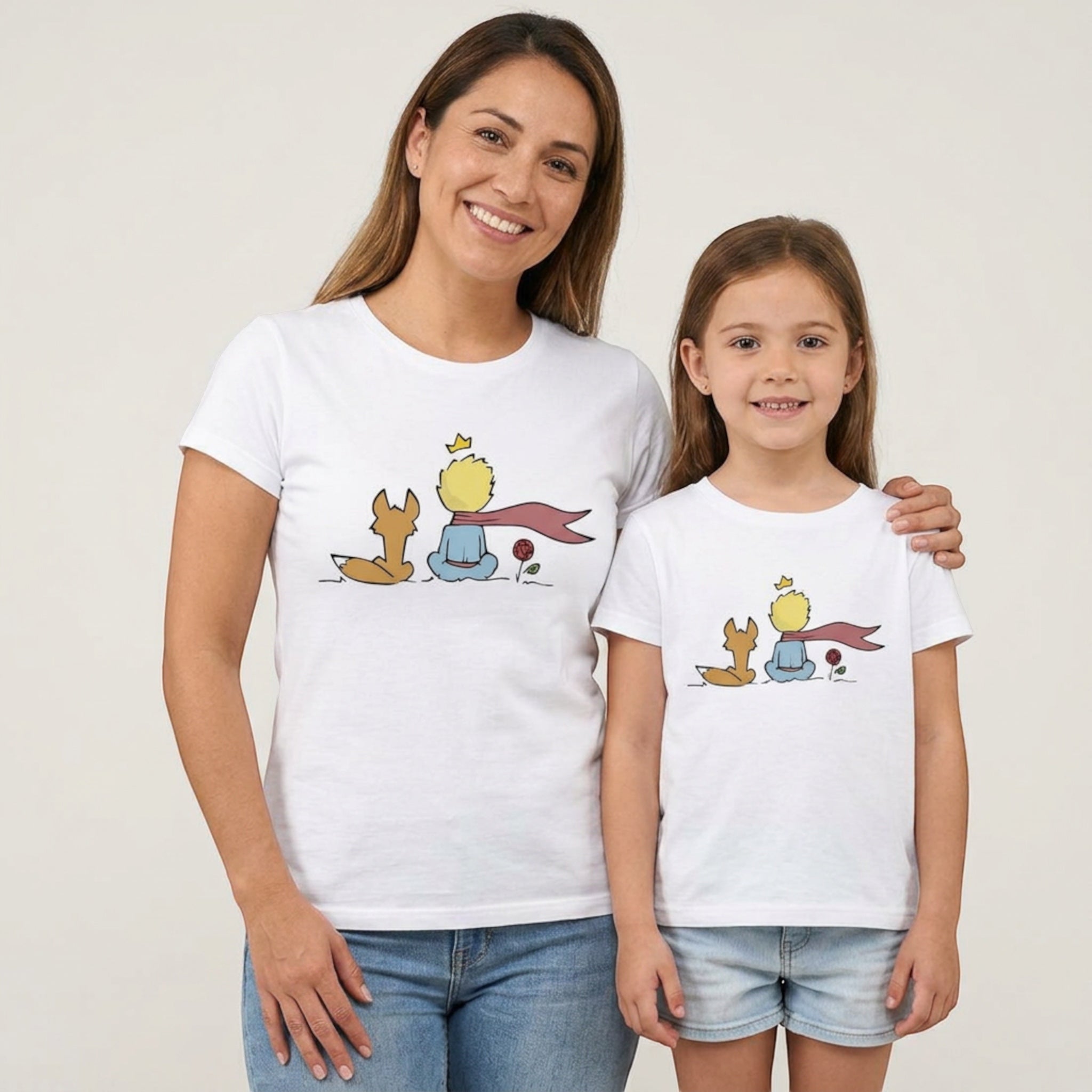 The Beauty Closet matching white t-shirts for mother and daughter featuring The Little Prince and fox graphic print.