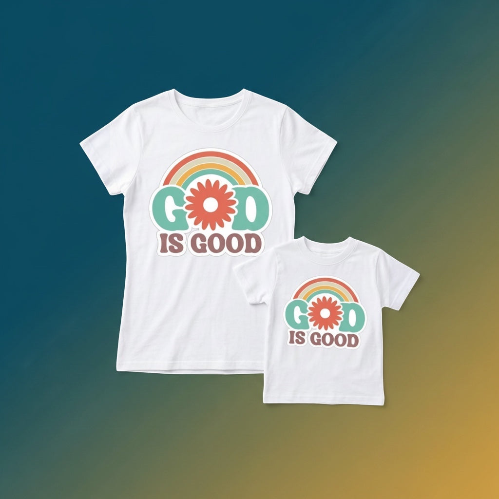 The Beauty Closet matching white t-shirts for mother and child featuring a retro rainbow and God Is Good graphic.