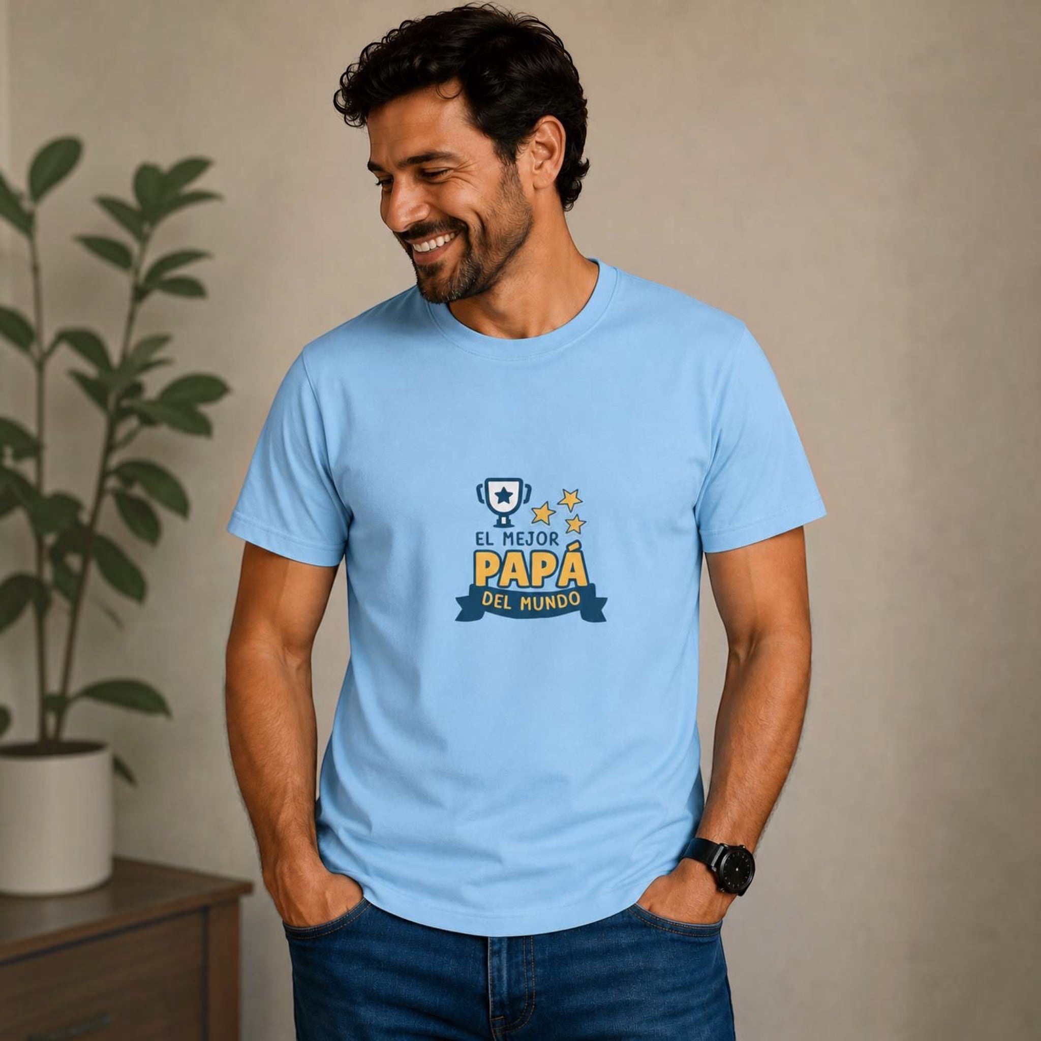 Man wearing a light blue The Beauty Closet t-shirt with El Mejor Papa Del Mundo trophy graphic for Father's Day.