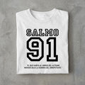 The Beauty Closet white cotton t-shirt featuring Salmo 91 graphic print in bold black lettering on a concrete surface