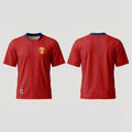 The Beauty Closet red and yellow striped short-sleeve soccer jersey with España crest and navy collar.