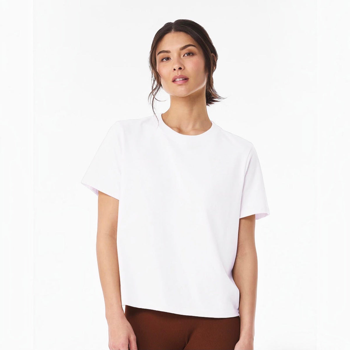 The Beauty Closet white crewneck cotton t-shirt worn by a woman with a relaxed fit for casual everyday wear