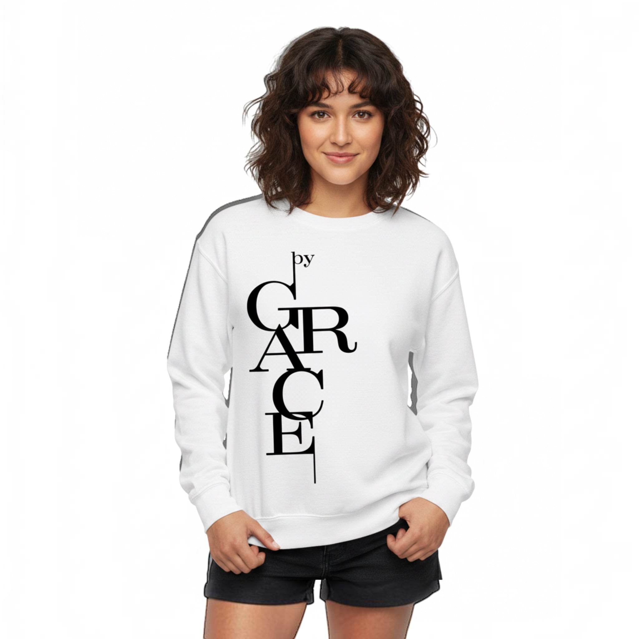 Woman wearing a white The Beauty Closet crewneck sweatshirt featuring a vertical black Grace graphic print.