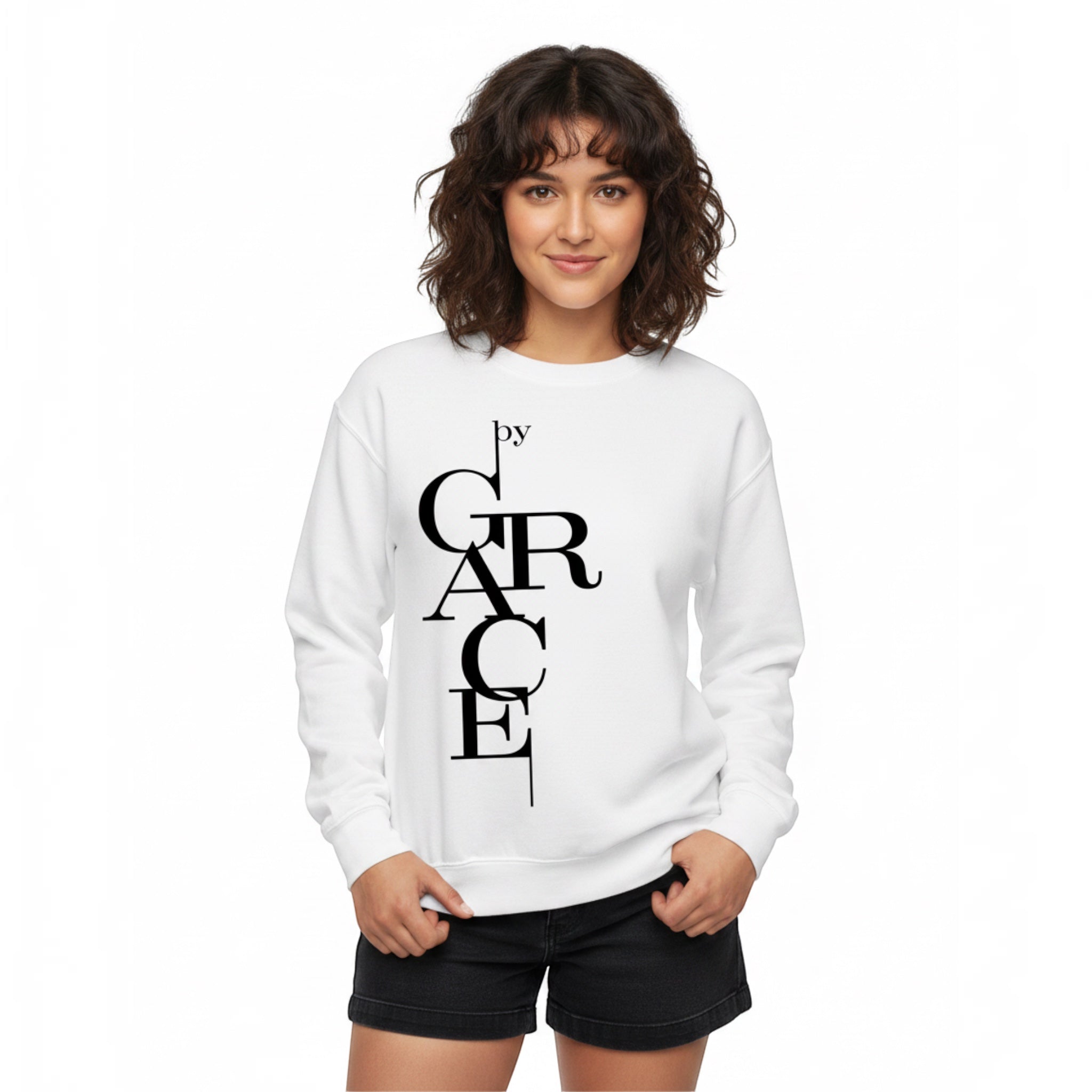 The Beauty Closet white crewneck sweatshirt with black Grace typography print worn by a woman with curly hair.