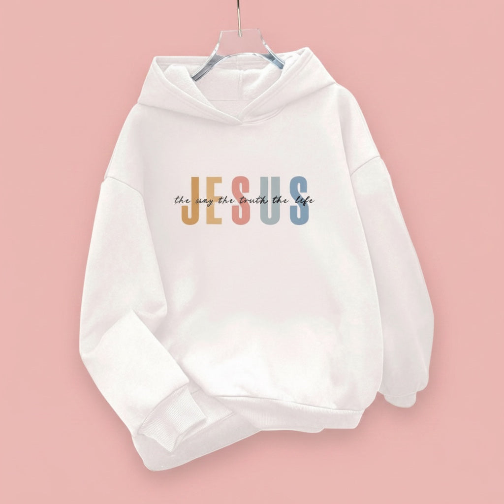 The Beauty Closet white oversized hoodie featuring a colorful Jesus graphic with minimalist typography on a pink background