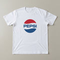 The Beauty Closet white cotton t-shirt featuring a classic red, white, and blue Pepsi logo graphic on the front.